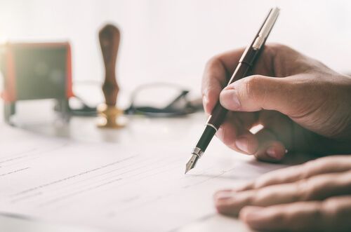 A notary preparing documents for signing