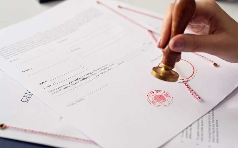 A Superior Notary Services agent notarizing a document